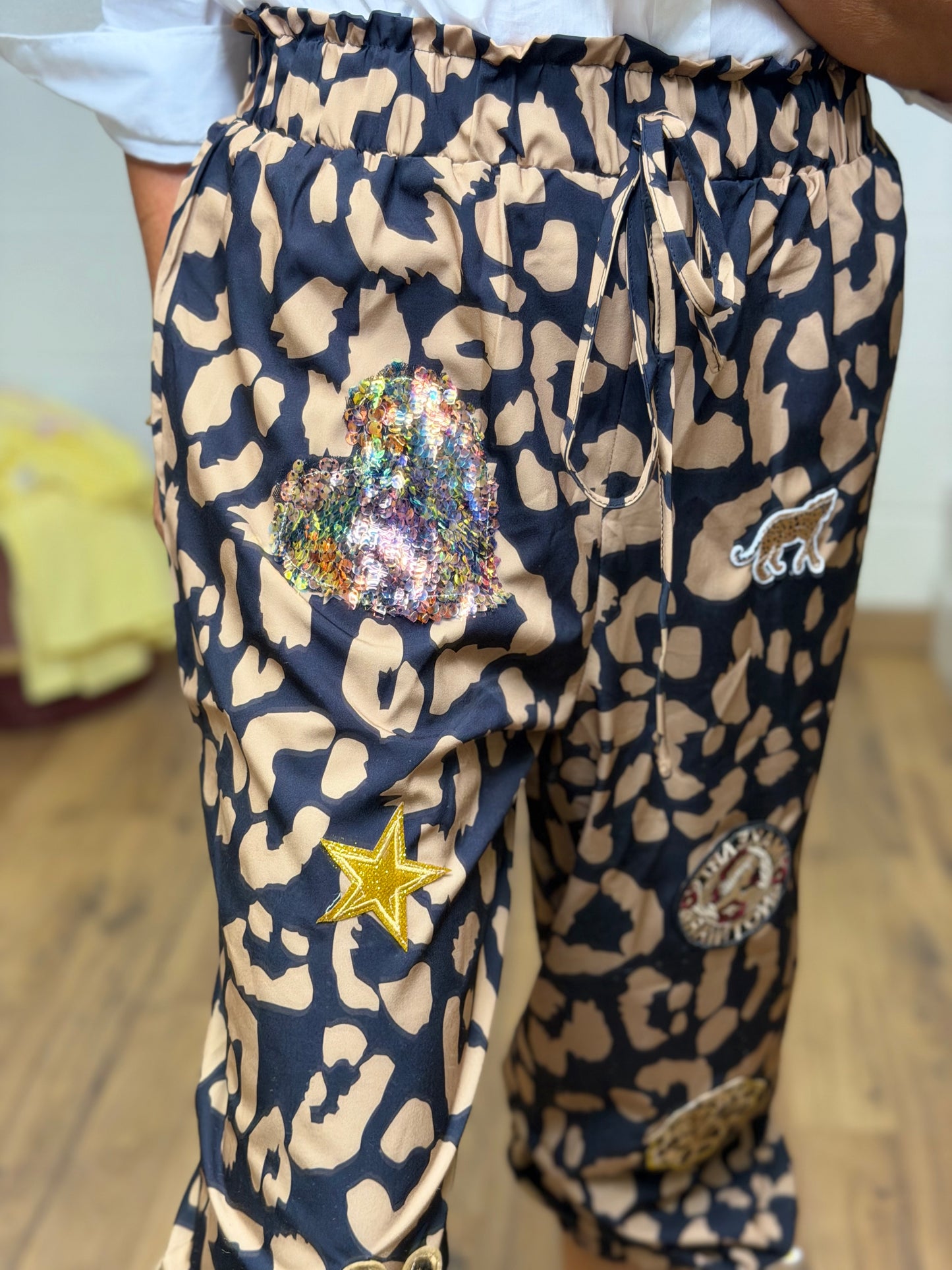 ABpink. Panta animalier stampa Leo