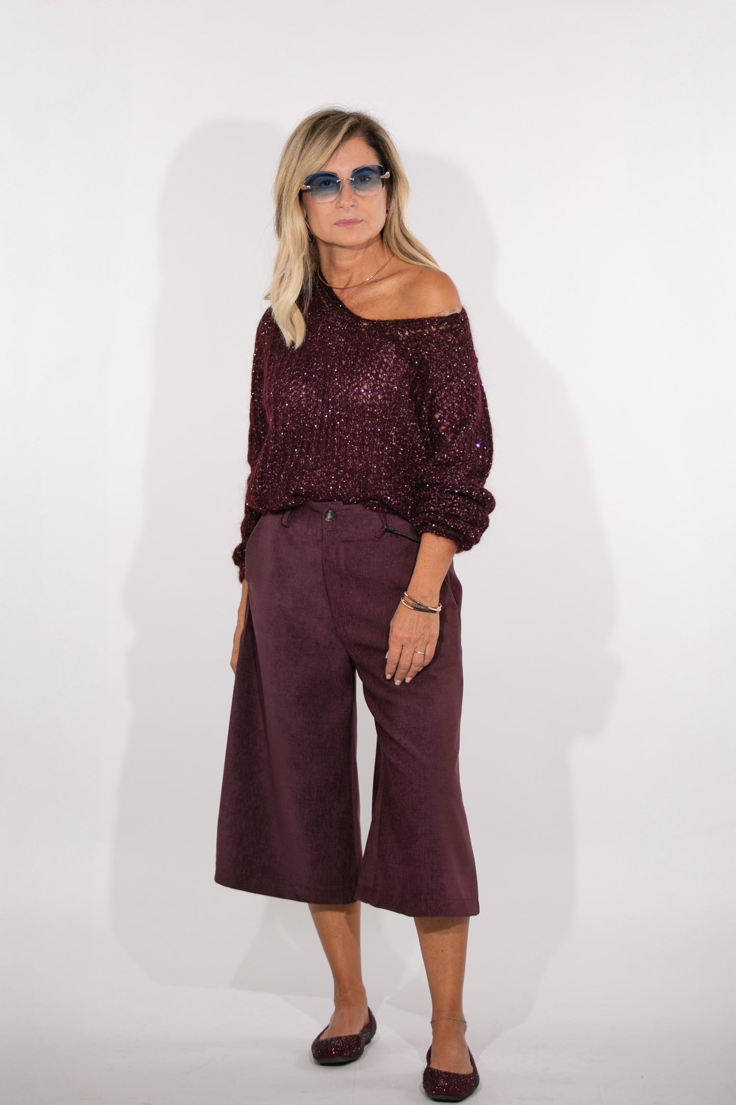 Le Streghe. Pull burgundi con paielletes