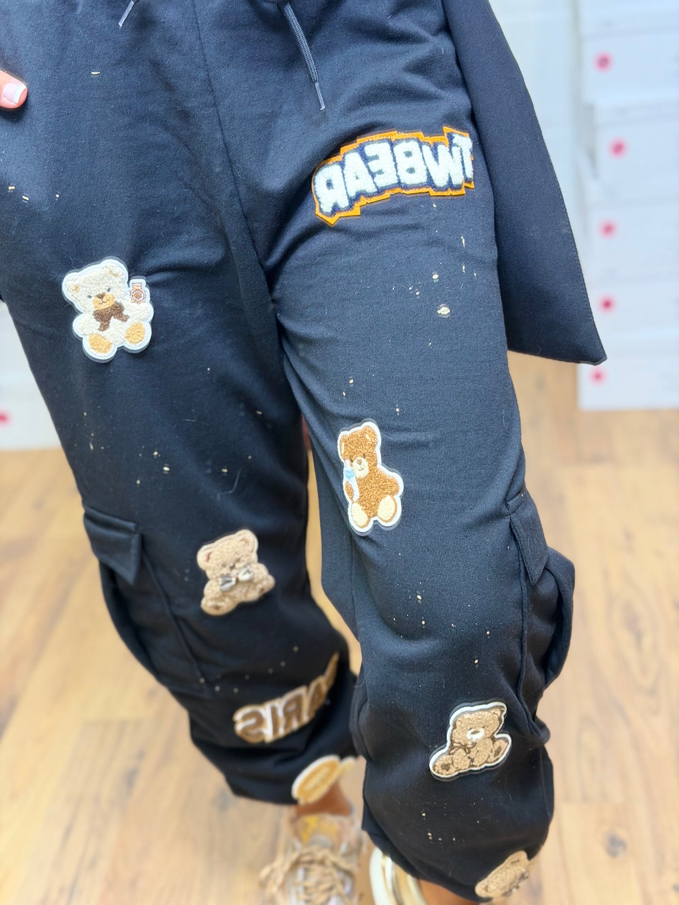 Abbino. Cargo nero teddy